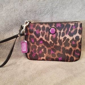 Authentic Coach ocelot wristlet in EUC